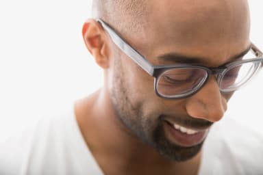 Smiling person with glasses